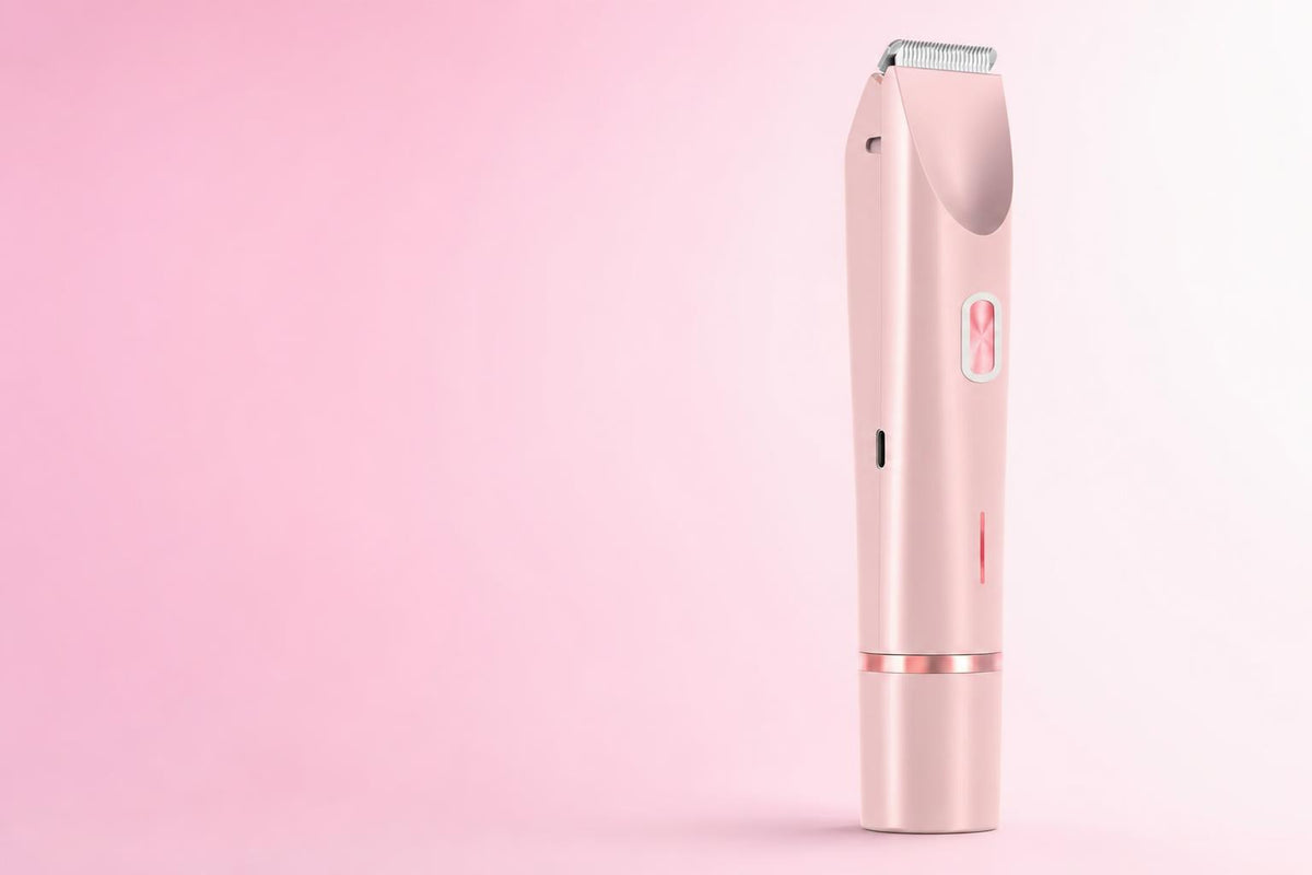 Depiladora eléctrica 2 en 1 rosa, vista de estudio